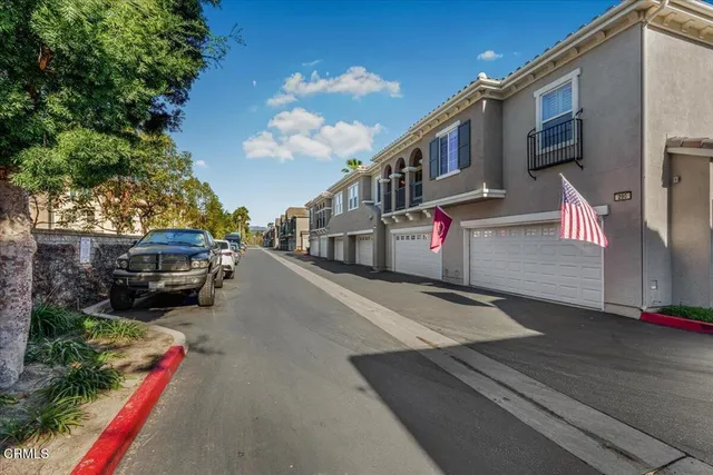 a swimming pool with outdoor seating and yard