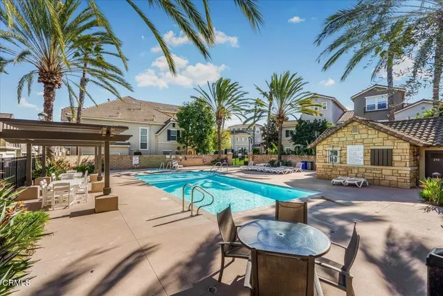 an aerial view of a house with mountain view