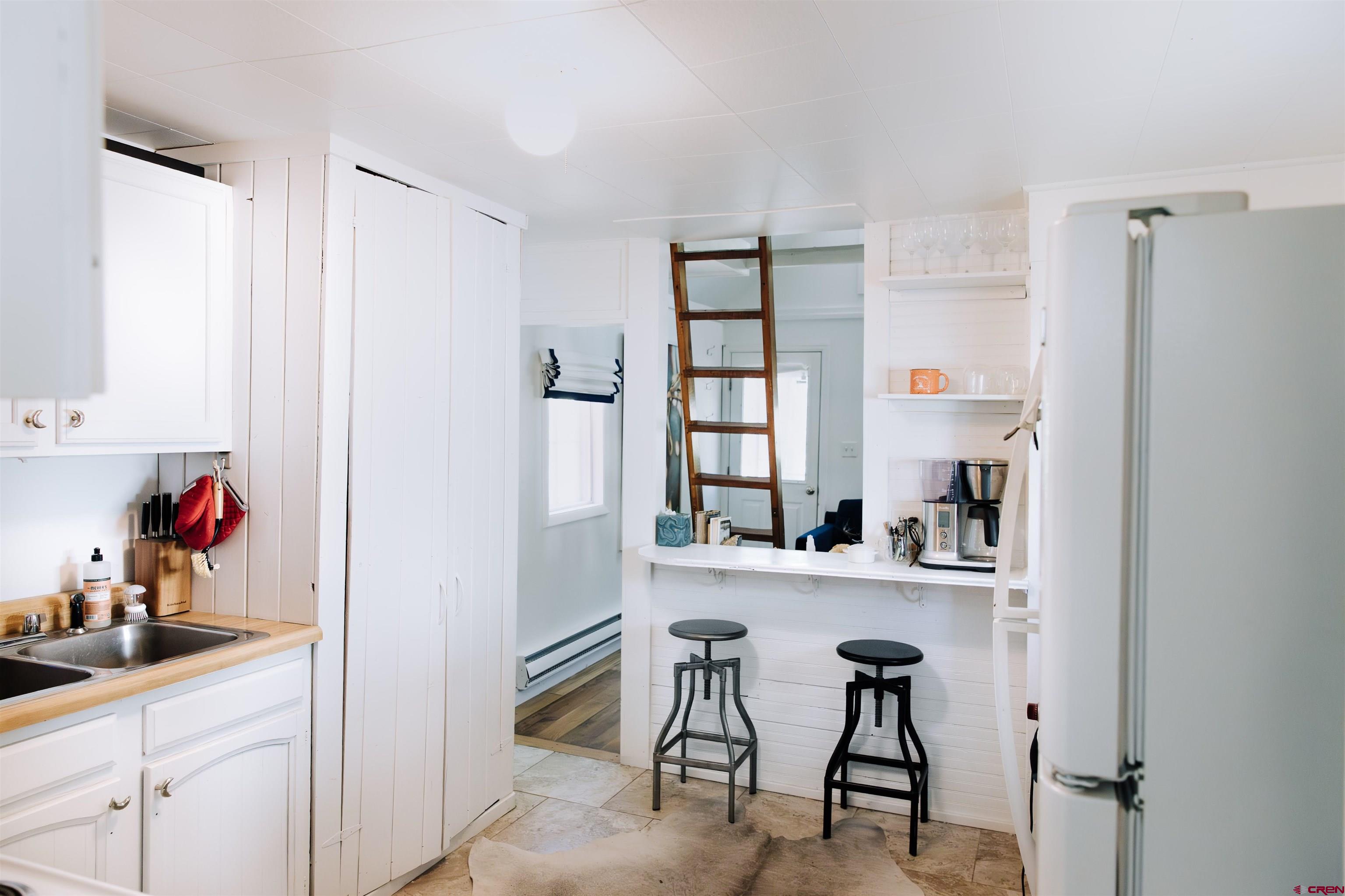 218 Maroon Avenue, Unit E Crested Butte, CO 81224 - Photo 11 of 22 a view of dining room and window