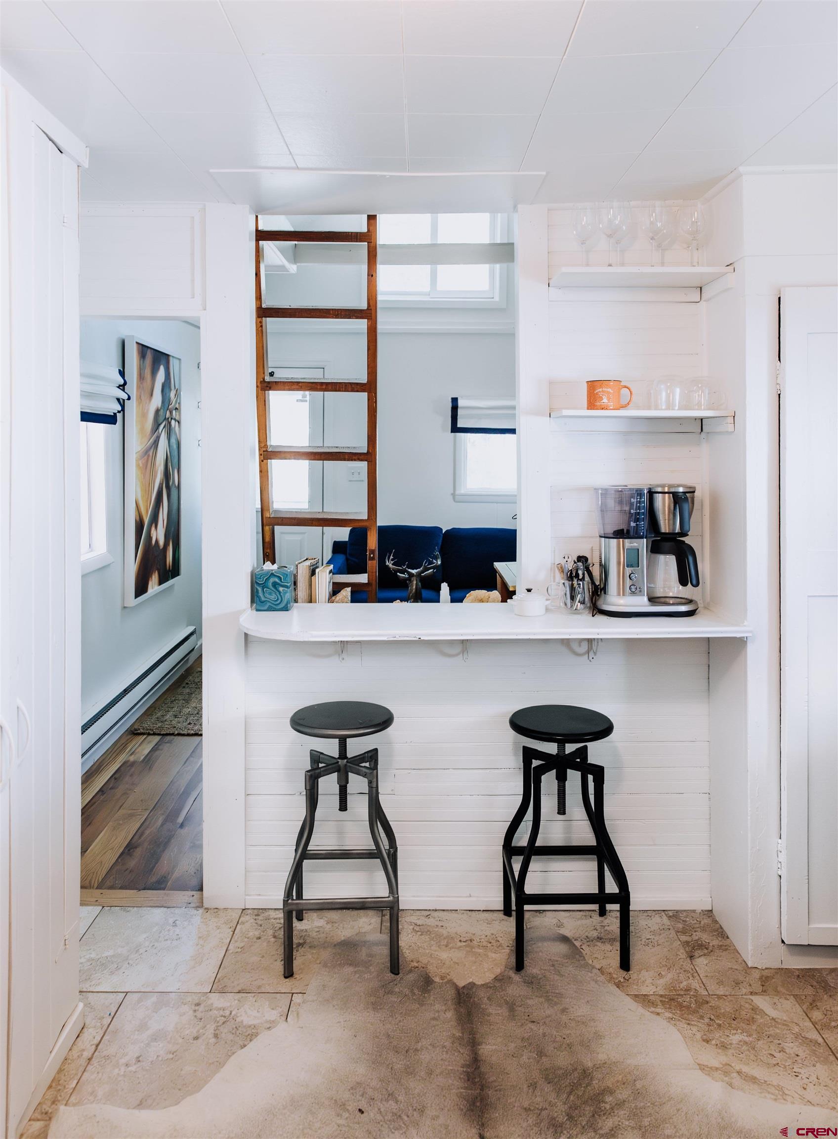218 Maroon Avenue, Unit E Crested Butte, CO 81224 - Photo 12 of 22 a kitchen with a sink cabinets and appliances