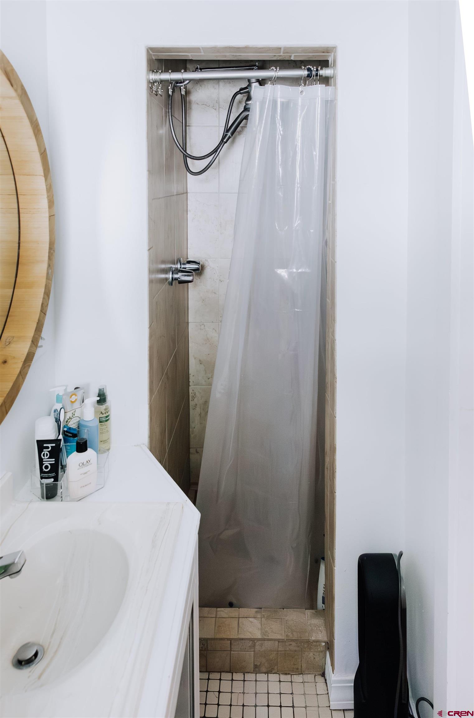 218 Maroon Avenue, Unit E Crested Butte, CO 81224 - Photo 15 of 22 a bathroom with a sink and a mirror