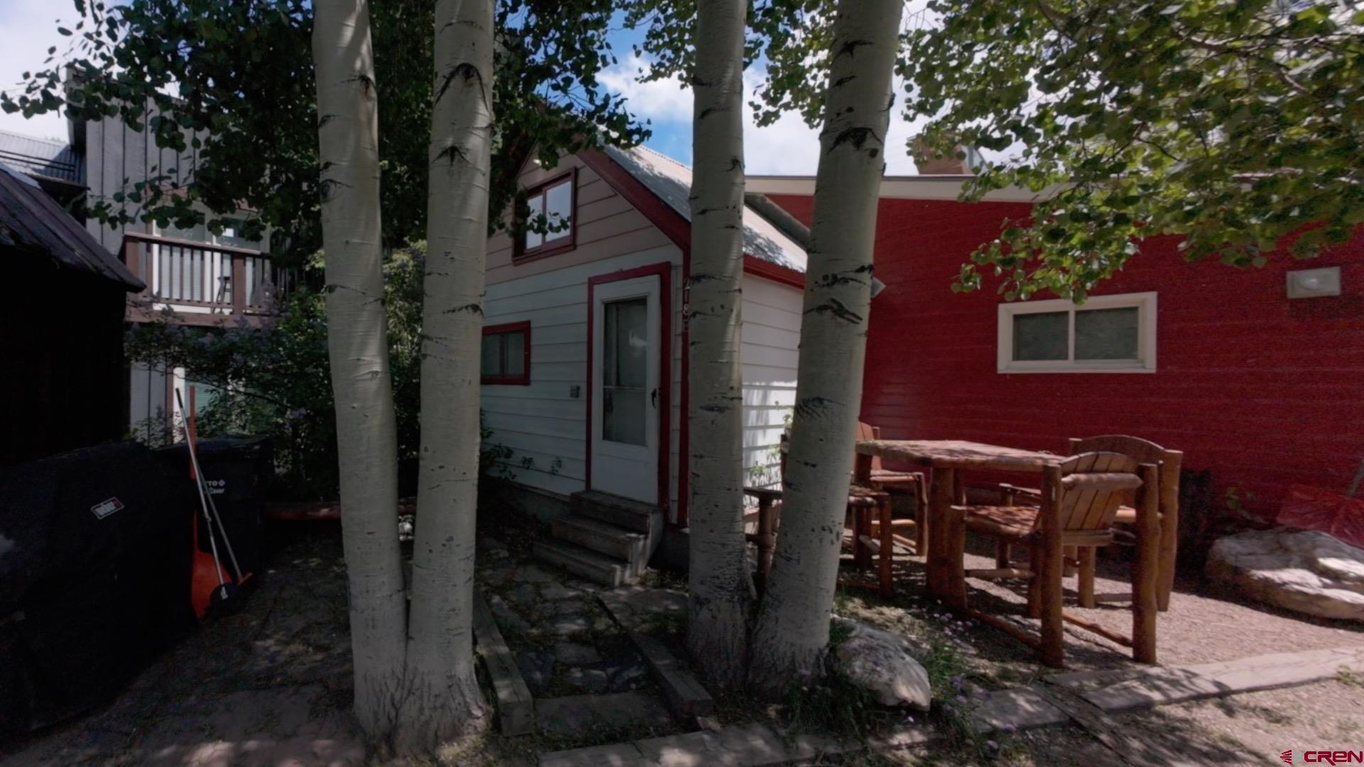 218 Maroon Avenue, Unit E Crested Butte, CO 81224 - Photo 20 of 22 a front view of a house
