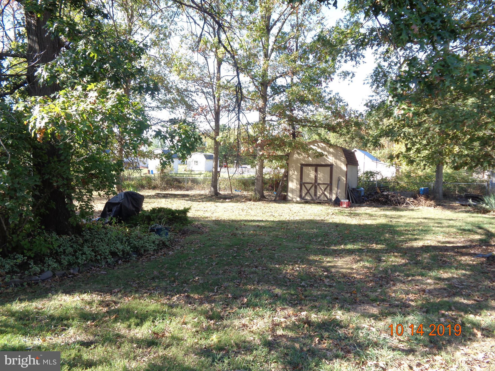 39 Coolidge Road Inwood, WV 25428 - Photo 3 of 26 FENCED BACK YARD W/ NICE SHED