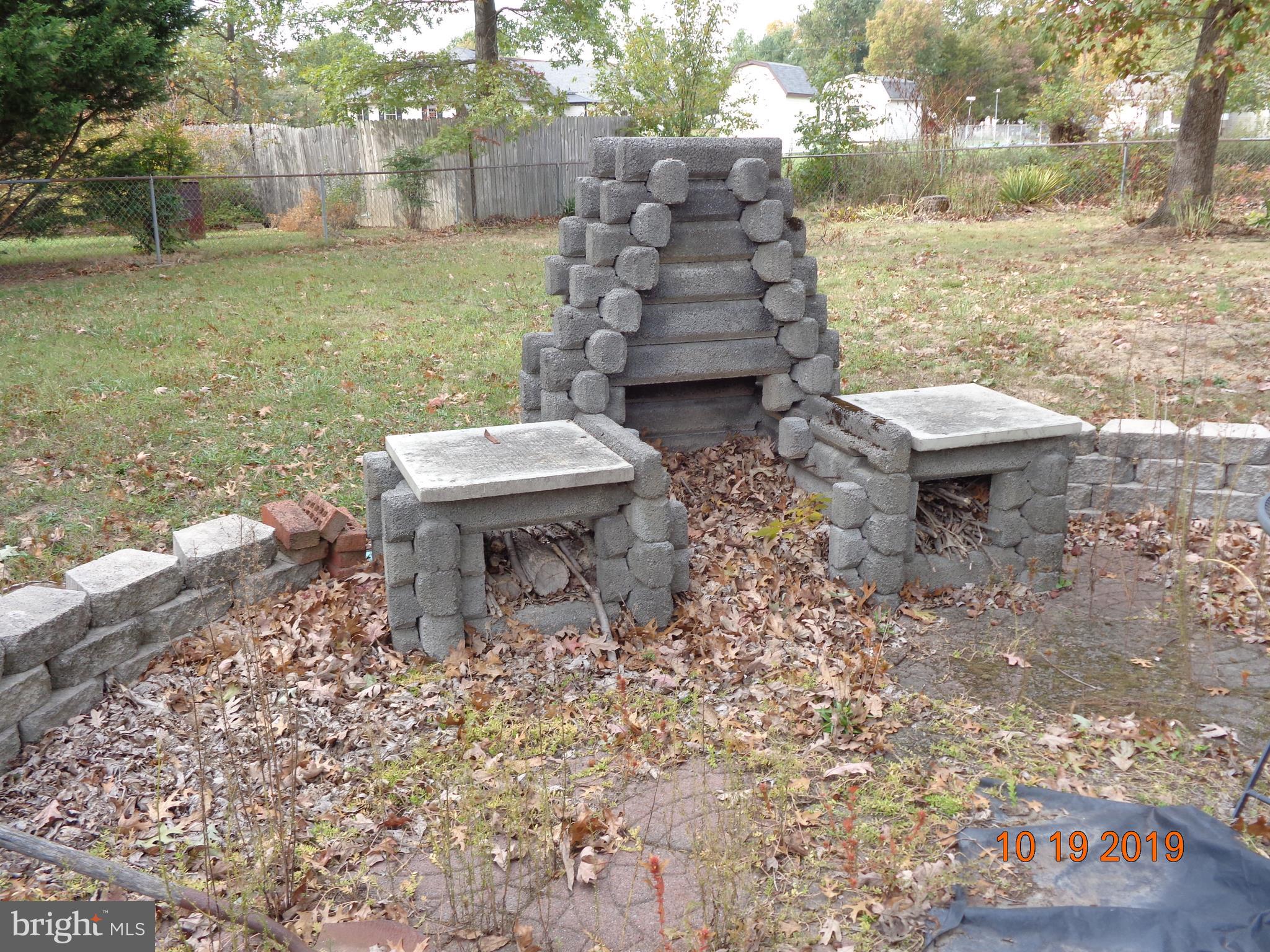 39 Coolidge Road Inwood, WV 25428 - Photo 23 of 26 PATIO AREA W/ FIREPLACE/PIT