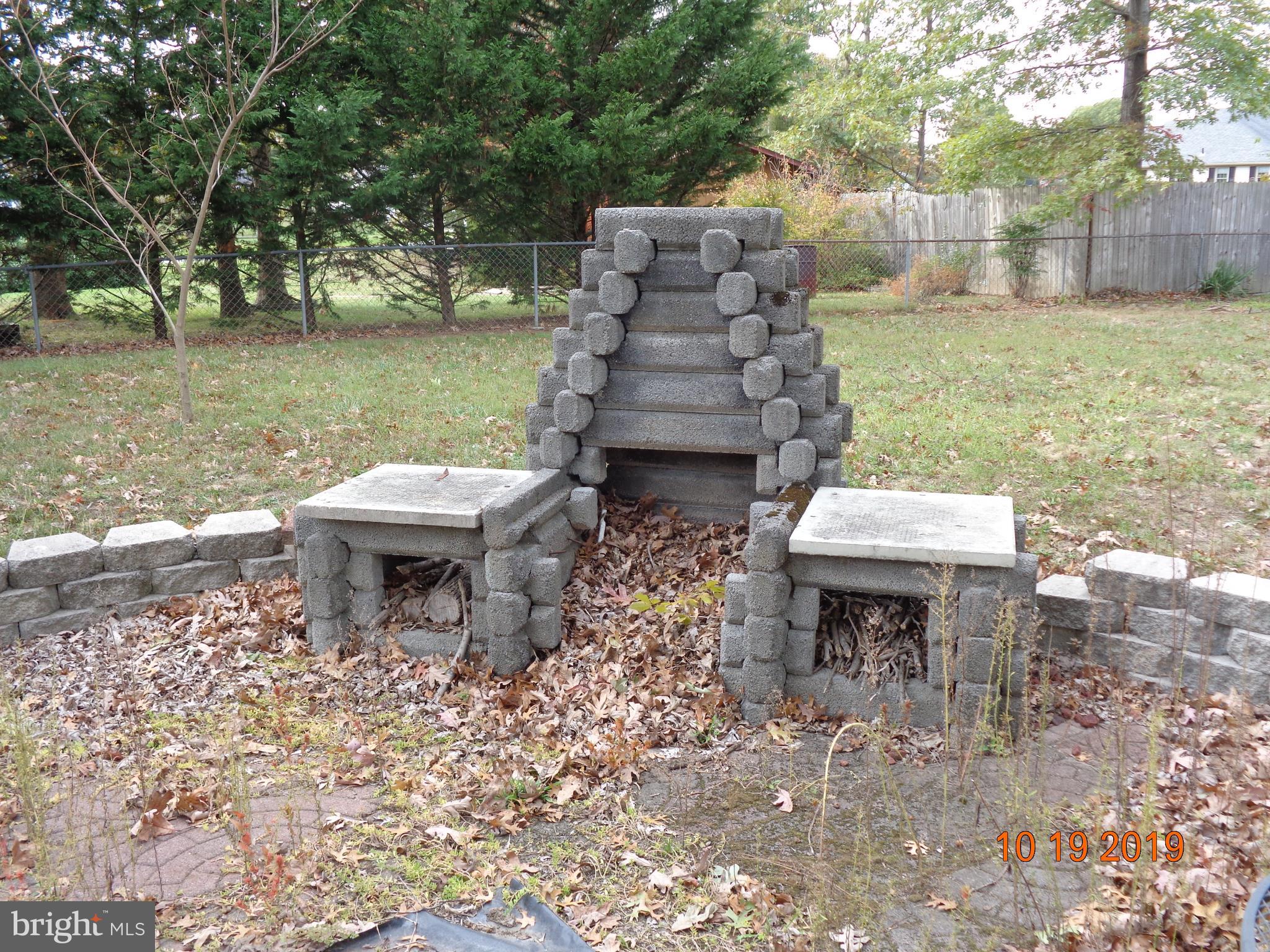 39 Coolidge Road Inwood, WV 25428 - Photo 24 of 26 PATIO AREA W/ FIREPLACE/PIT