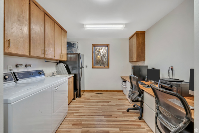 887 Village Way Alpine, UT 84004 - Photo 19 of 28 Laundry area with light wood-style floors, an office area, and washer and dryer