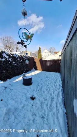 a house view with a backyard space