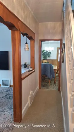 a living room with furniture and window