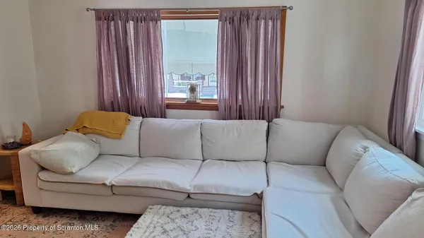 a view of staircase with living room