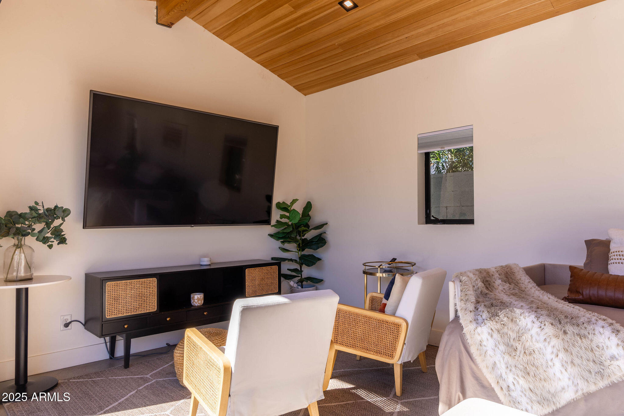 68 West Lewis Avenue Phoenix, AZ 85003 - Photo 36 of 42 a living room with furniture and a flat screen tv