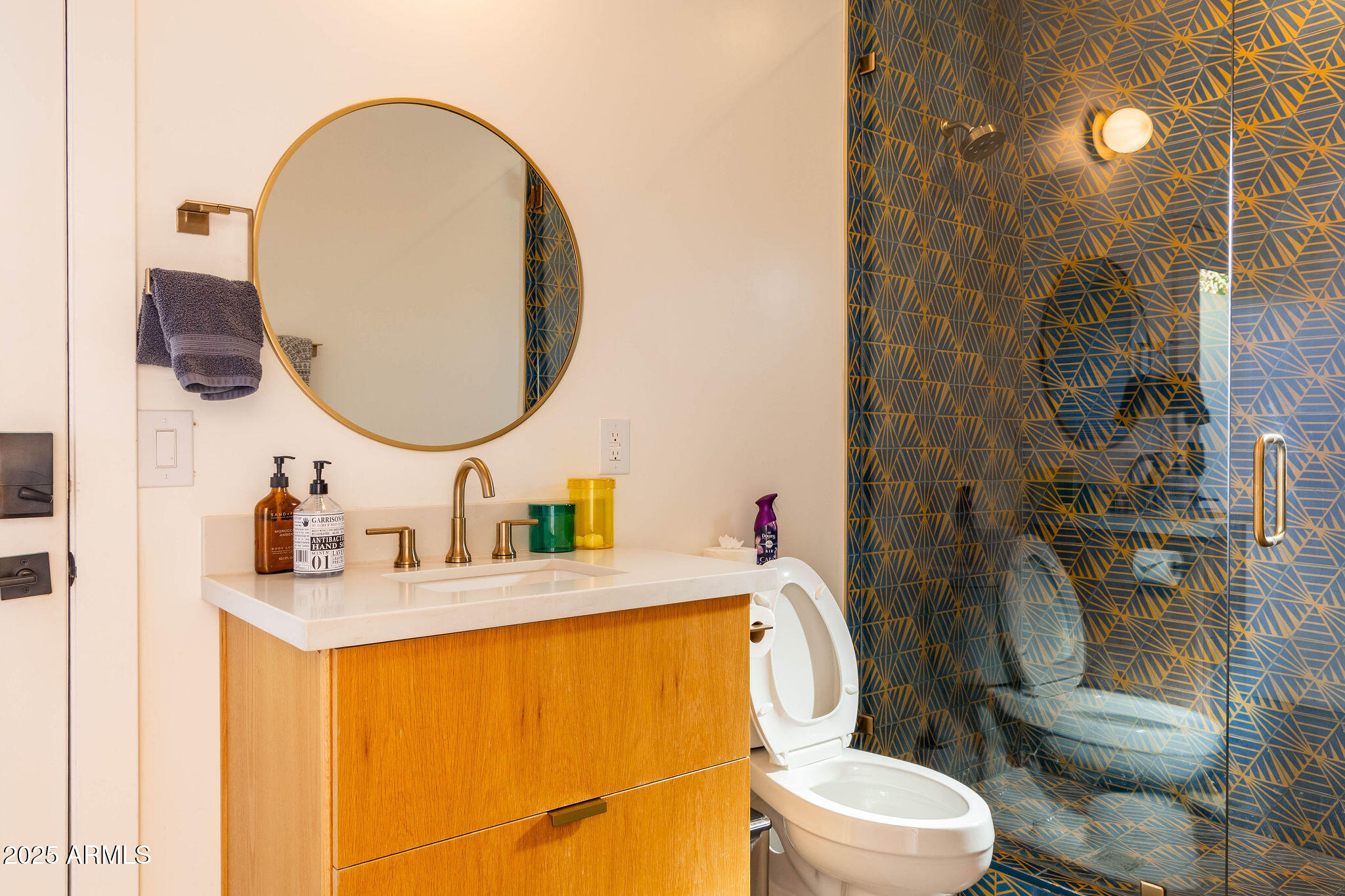 68 West Lewis Avenue Phoenix, AZ 85003 - Photo 39 of 42 a bathroom with a granite countertop toilet sink and mirror