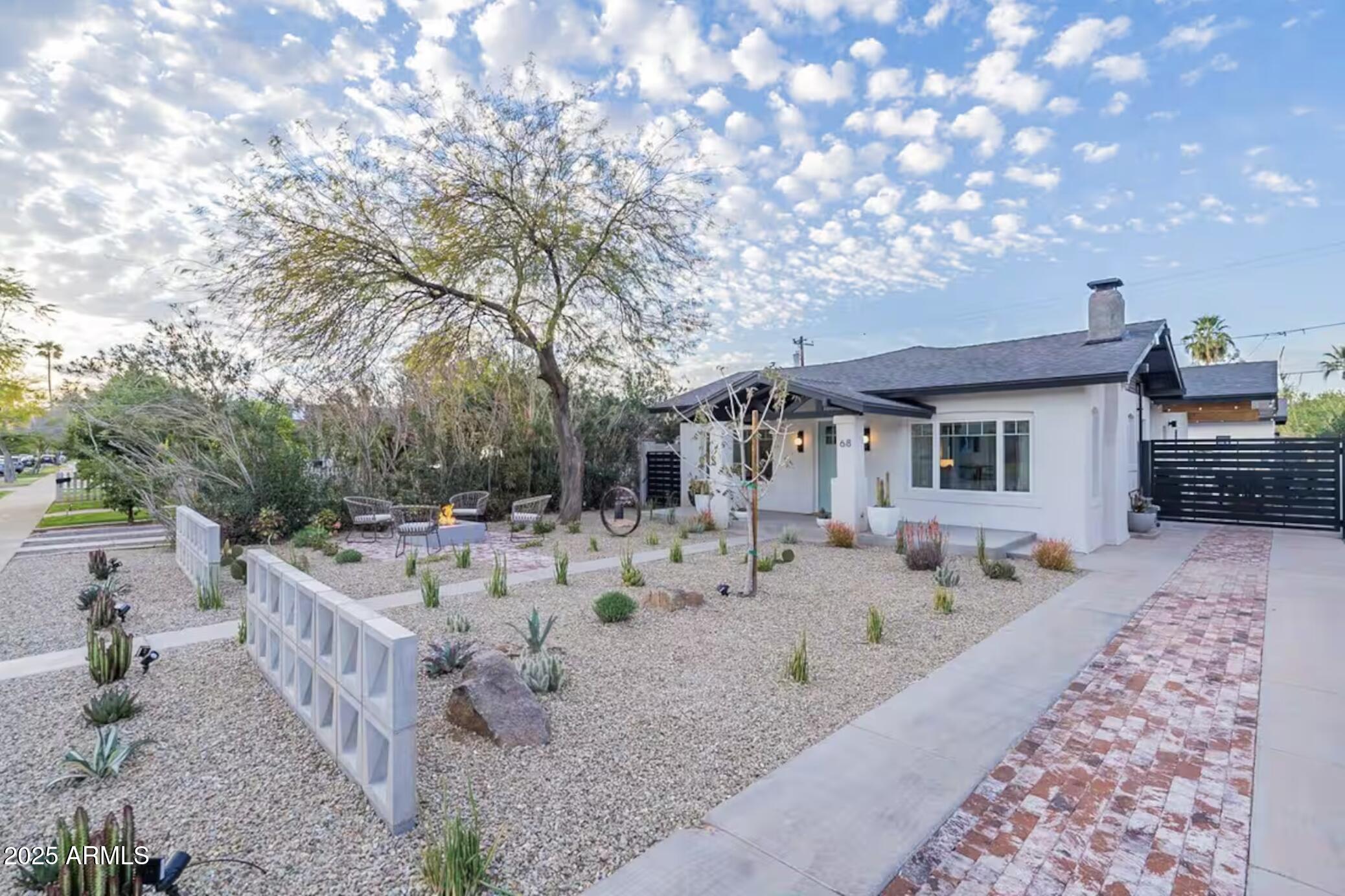 68 West Lewis Avenue Phoenix, AZ 85003 - Photo 4 of 42 a view of a house with backyard and sitting area