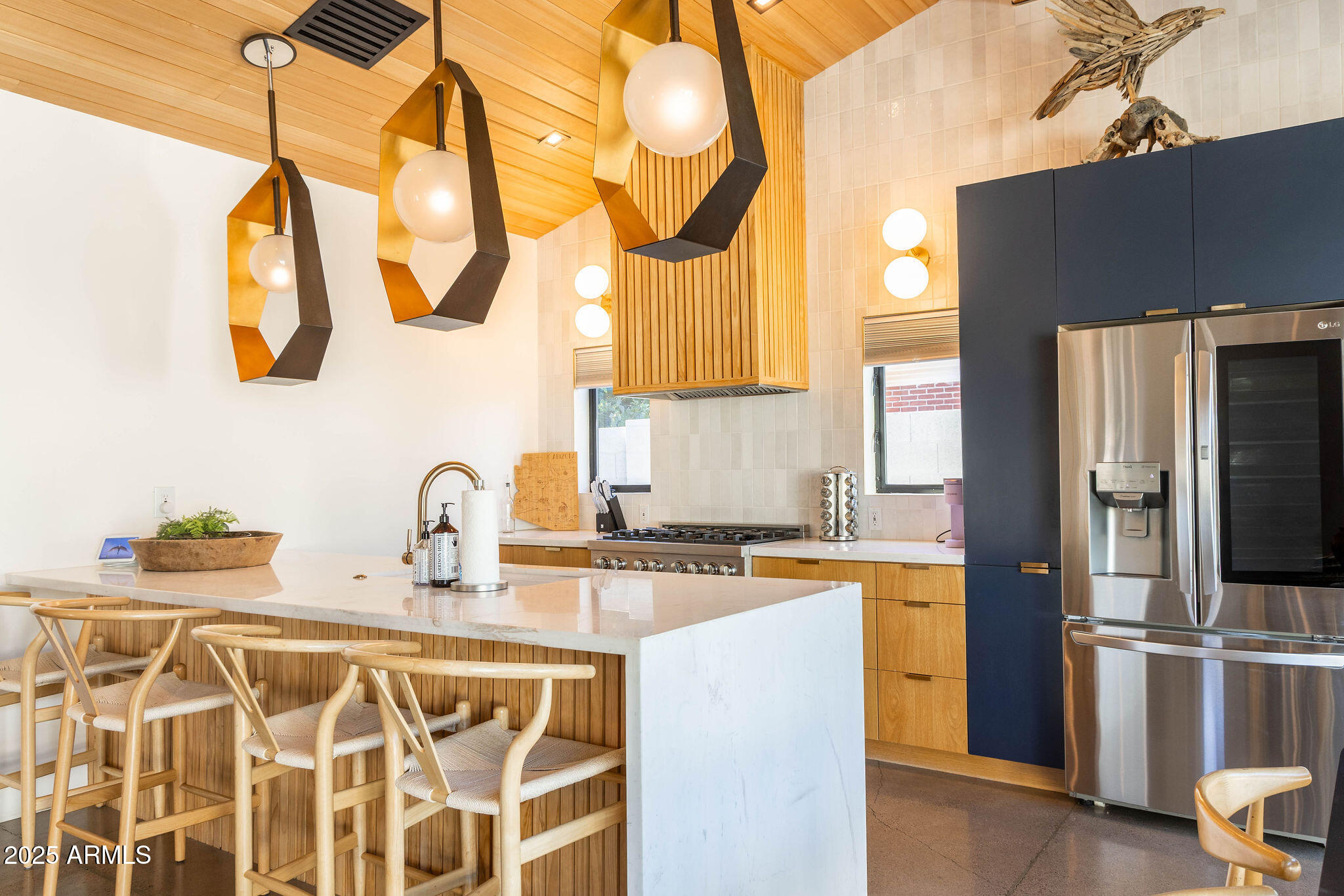 68 West Lewis Avenue Phoenix, AZ 85003 - Photo 6 of 42 a kitchen with stainless steel appliances a sink and a refrigerator