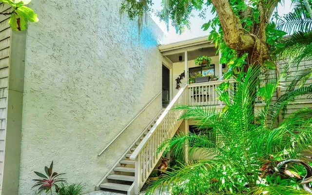 a view of balcony with garden