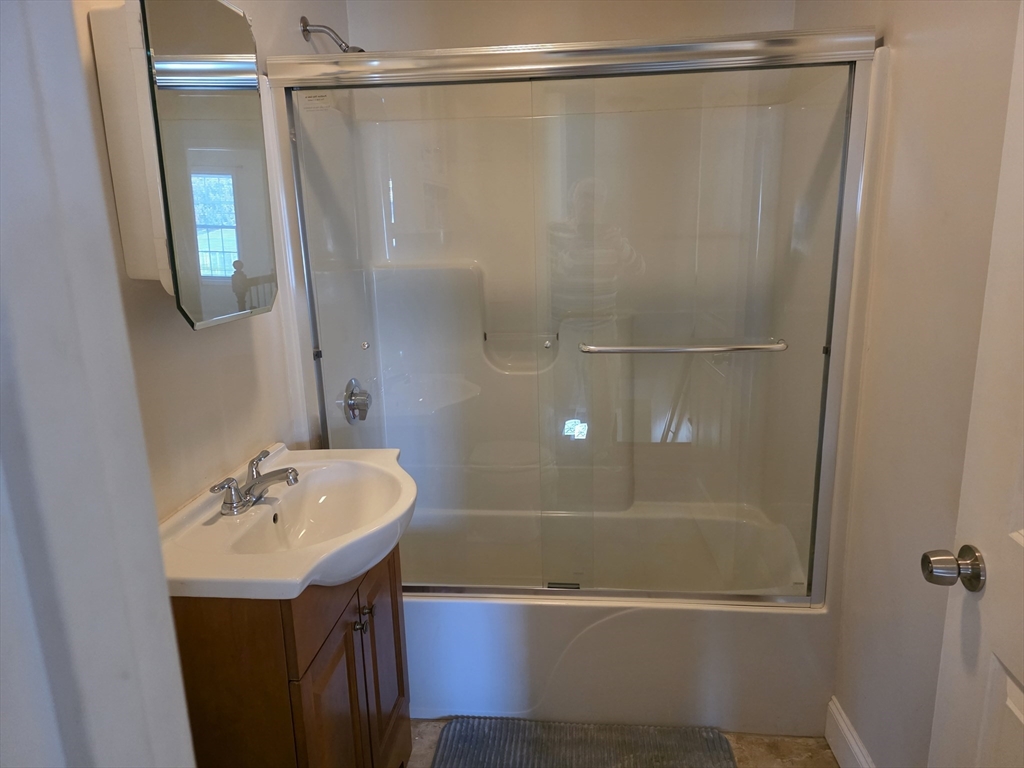 176 Oak Grove Avenue Fall River, MA 02723 - Photo 7 of 9 a bathroom with a shower and a sink