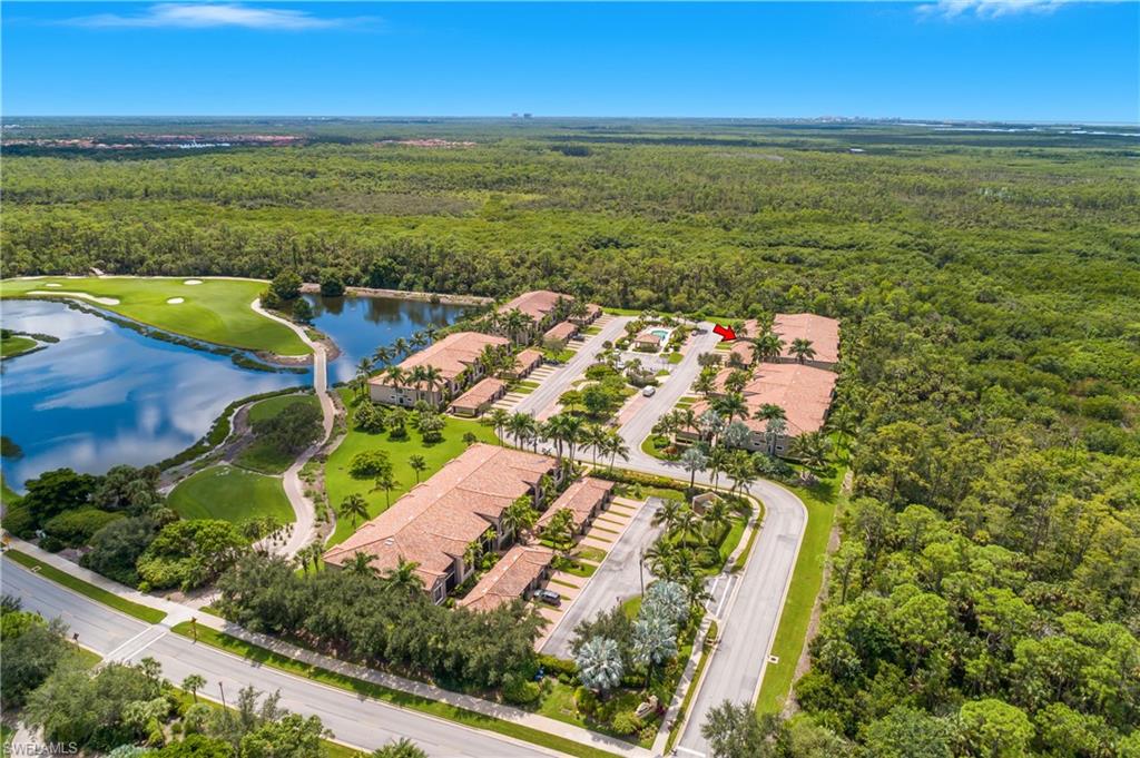 9832 Venezia Circle, Unit 1013 Naples, FL 34113 - Photo 32 of 34 a view of an ocean from a balcony
