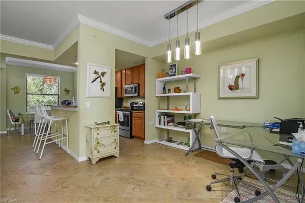 a view of a workspace with furniture