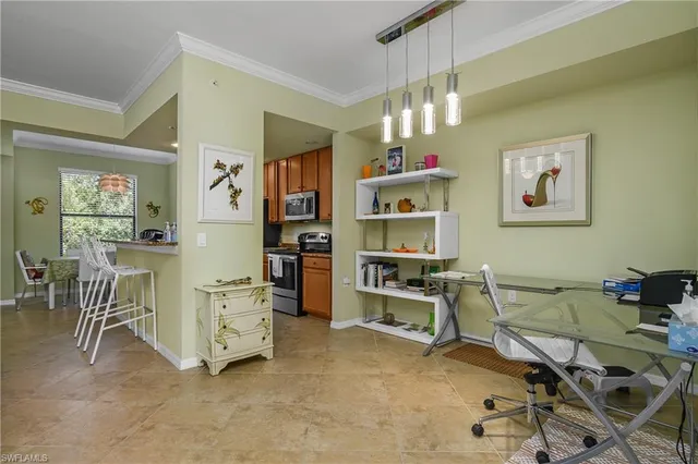 a view of a workspace with furniture