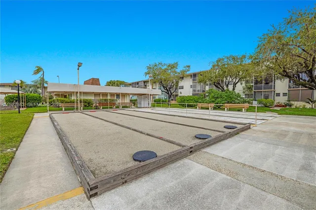 a view of a swimming pool with a chairs