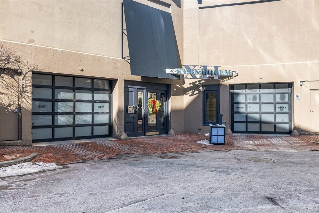12 Stoneholm Street, Unit 529 Boston, MA 02115 - Photo 11 of 11 a view of a house with a garage