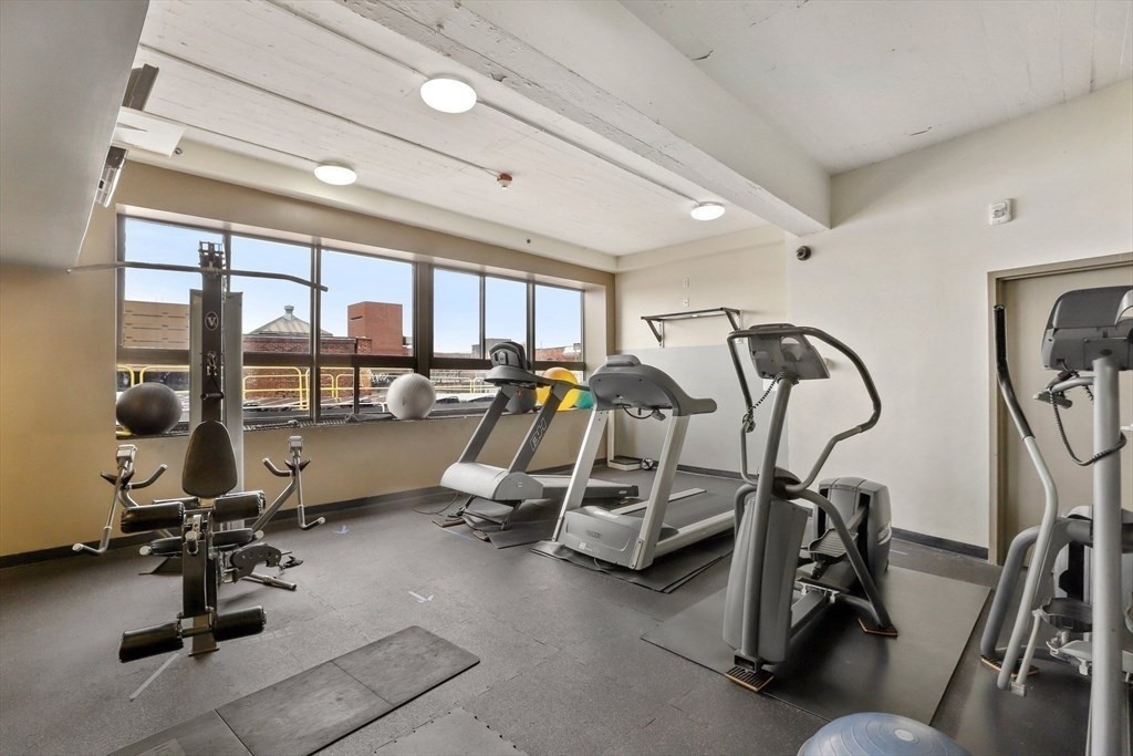 12 Stoneholm Street, Unit 529 Boston, MA 02115 - Photo 9 of 11 a view of a room with gym equipment