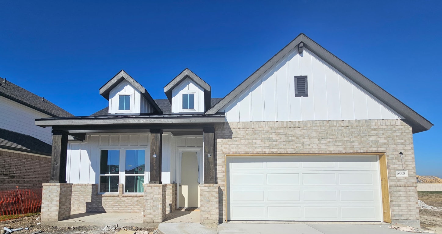 a front view of a house with a porch