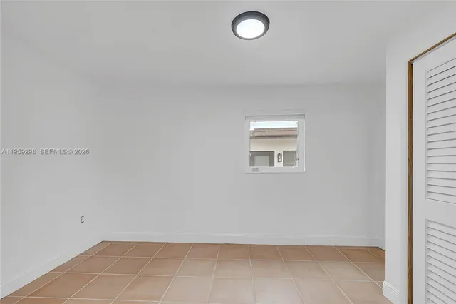 an empty room with a workbench