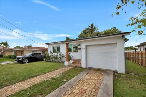 a house view with a garden space