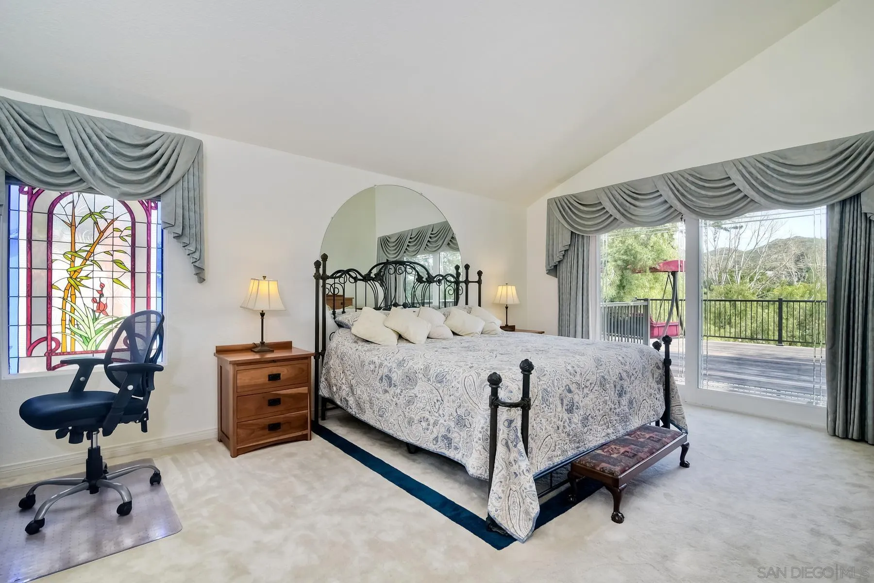 14859 Derringer Road Poway, CA 92064 - Photo 20 of 39 a bed sitting in a bedroom next to a window