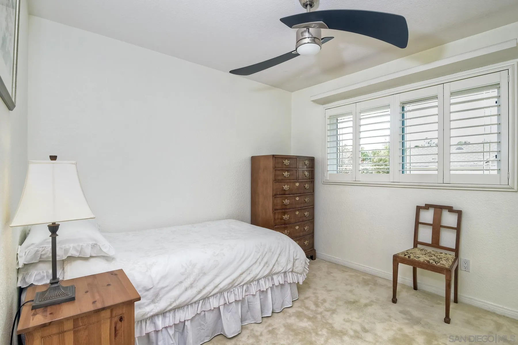 14859 Derringer Road Poway, CA 92064 - Photo 29 of 39 a bedroom with a bed and a window