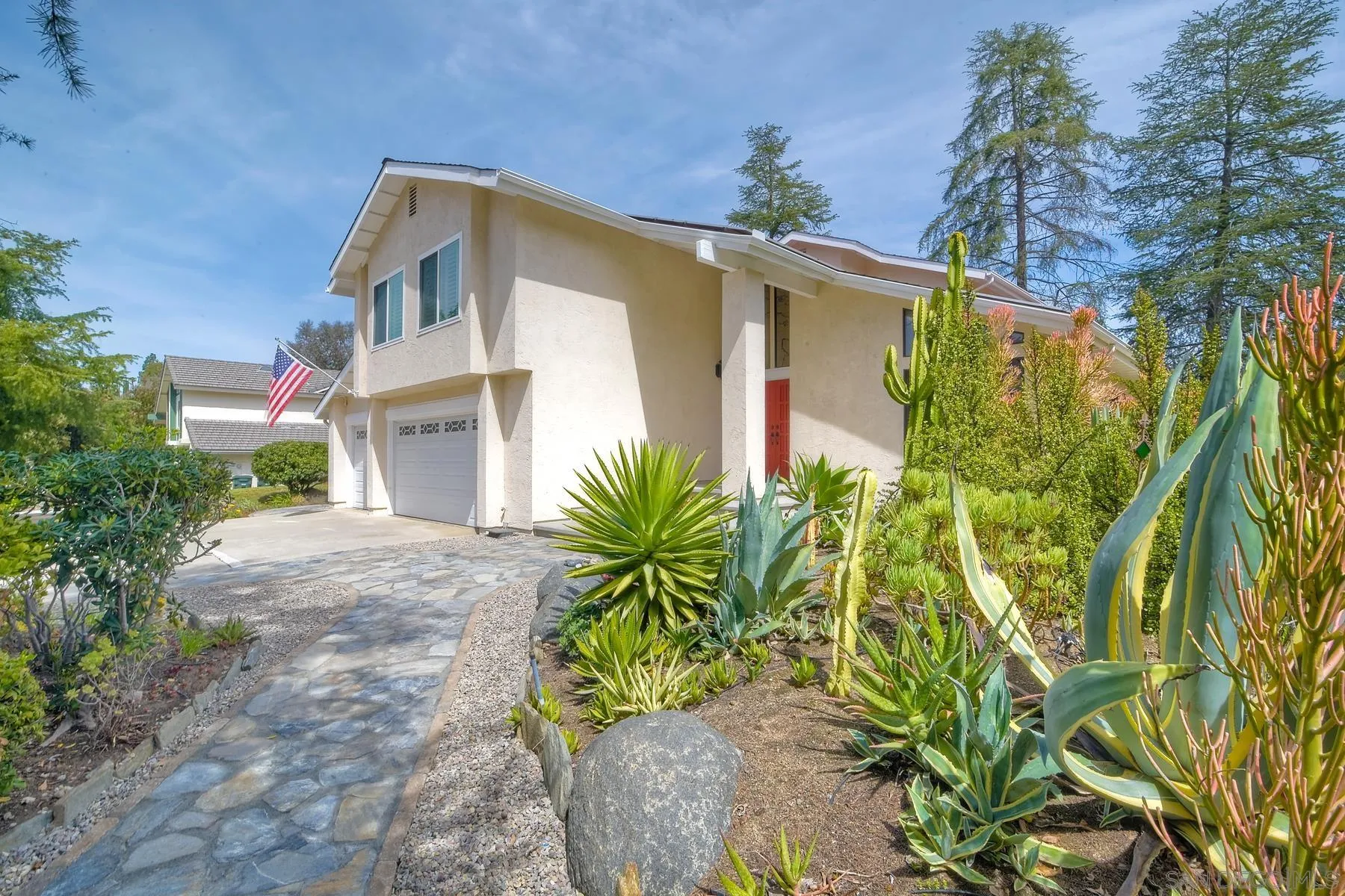 14859 Derringer Road Poway, CA 92064 - Photo 3 of 39 a front view of a house with a yard