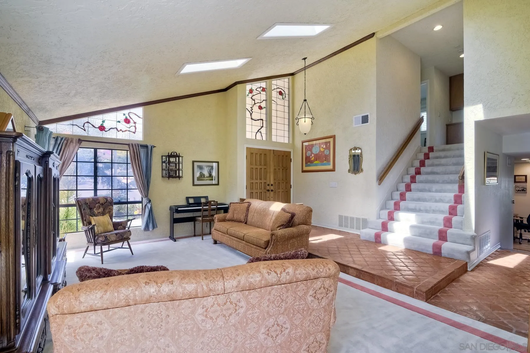 14859 Derringer Road Poway, CA 92064 - Photo 7 of 39 a living room with furniture and large windows