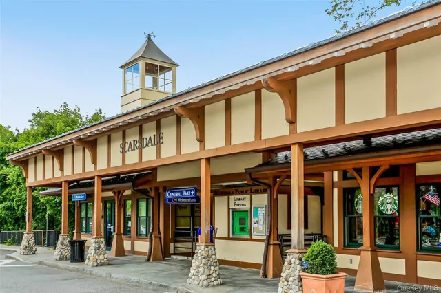 a front view of a building with street view