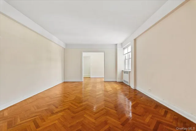 a view of an empty room and window