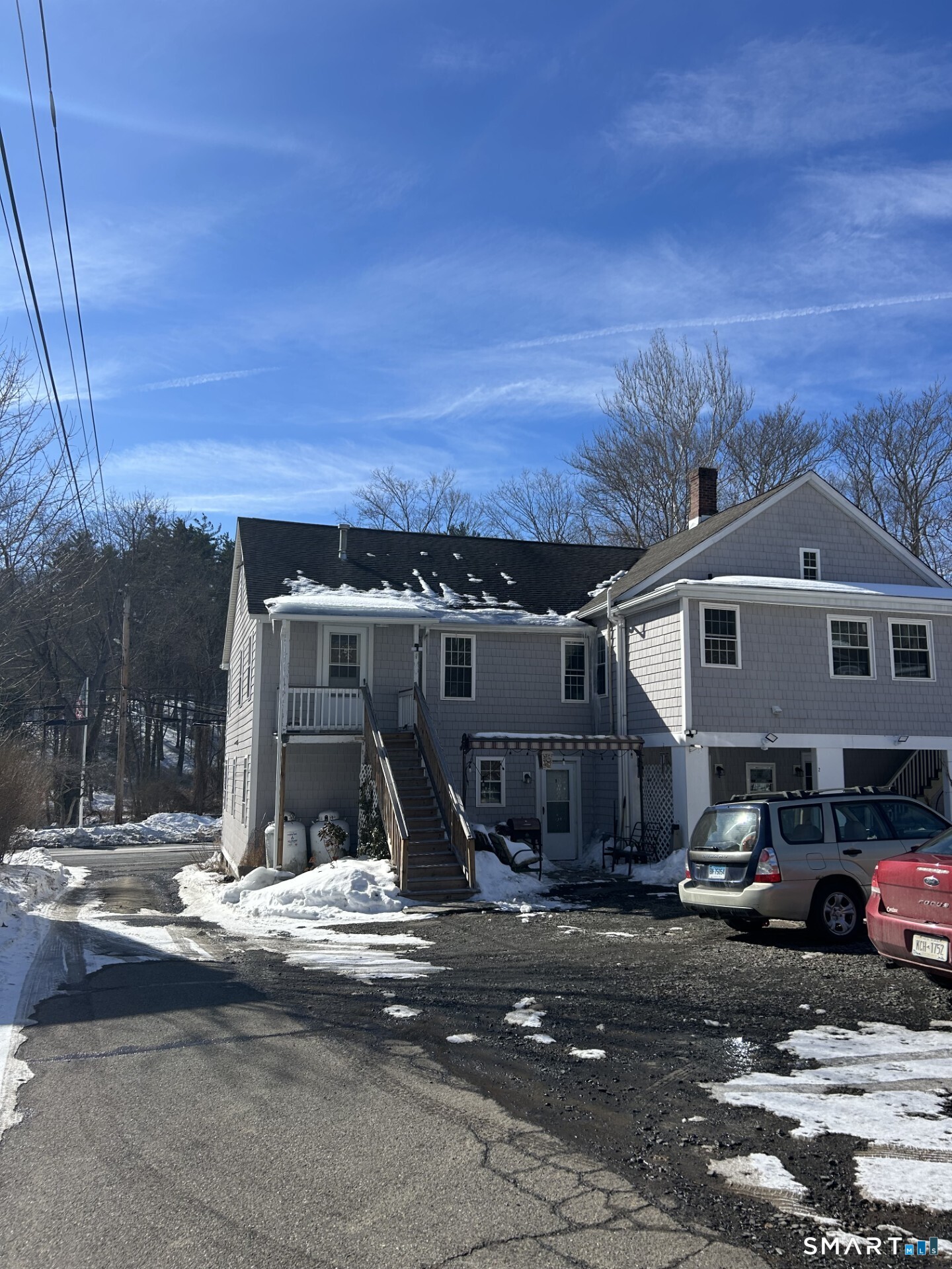 4 Weekeepeemee Road Woodbury, CT 06798 - Photo 17 of 18 a front view of a house with a yard