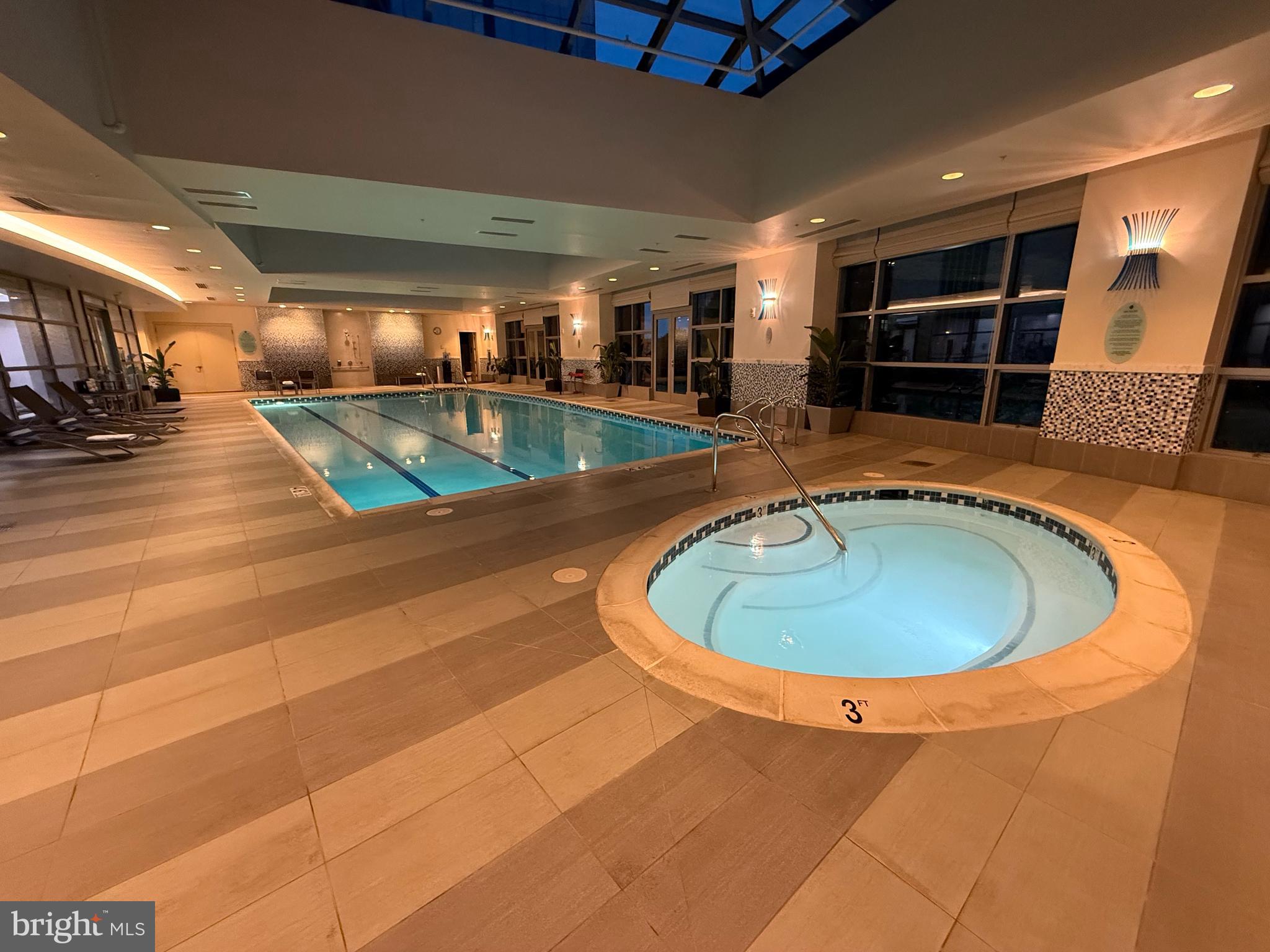 1881 North Nash Street, Unit 408 Arlington, VA 22209 - Photo 33 of 44 a view of a swimming pool with an outdoor space