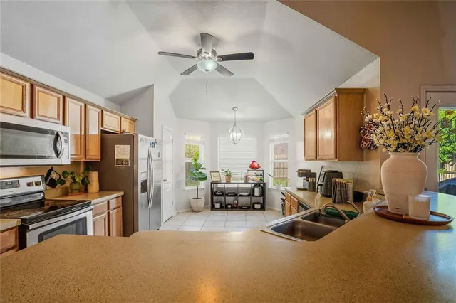 a view of a yard with a patio