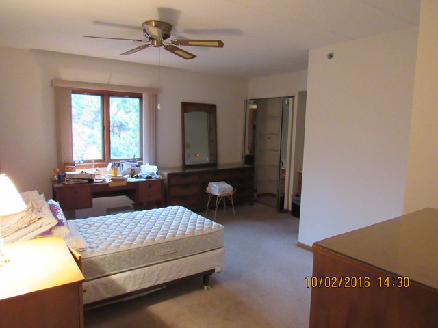 10640 Ridgeland Avenue, Unit 2A Chicago Ridge, IL 60415 - Photo 8 of 15 a living room with furniture
