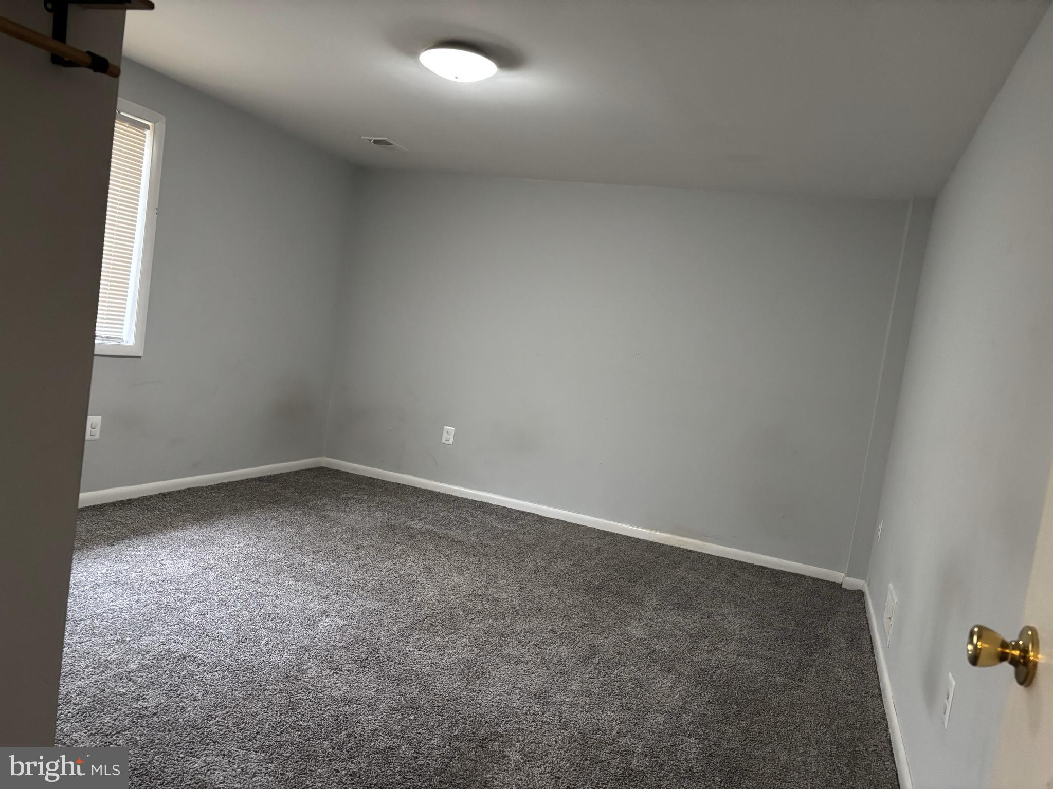 1404 Morningside Drive Silver Spring, MD 20904 - Photo 8 of 12 an empty room with a window