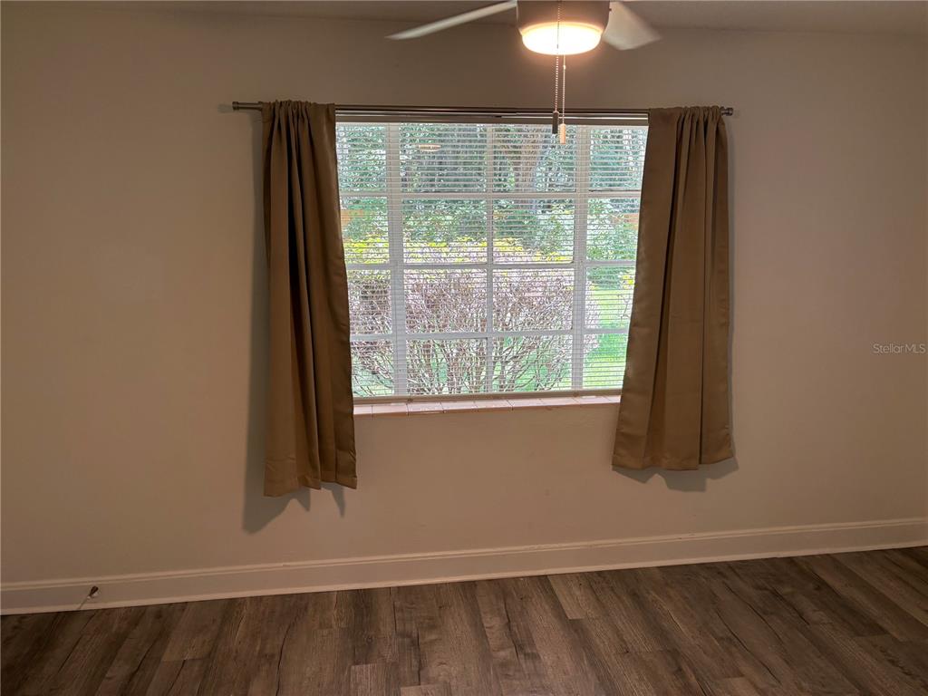 706 Northwest 20th Street Gainesville, FL 32603 - Photo 18 of 46 a window in an empty room