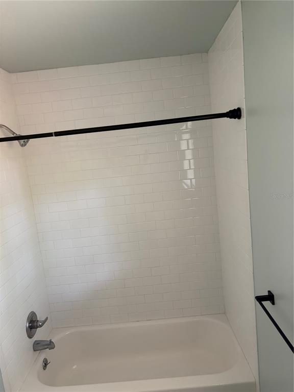 706 Northwest 20th Street Gainesville, FL 32603 - Photo 23 of 46 a bathroom with a shower