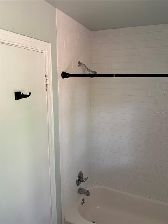 706 Northwest 20th Street Gainesville, FL 32603 - Photo 24 of 46 a bathroom with a shower