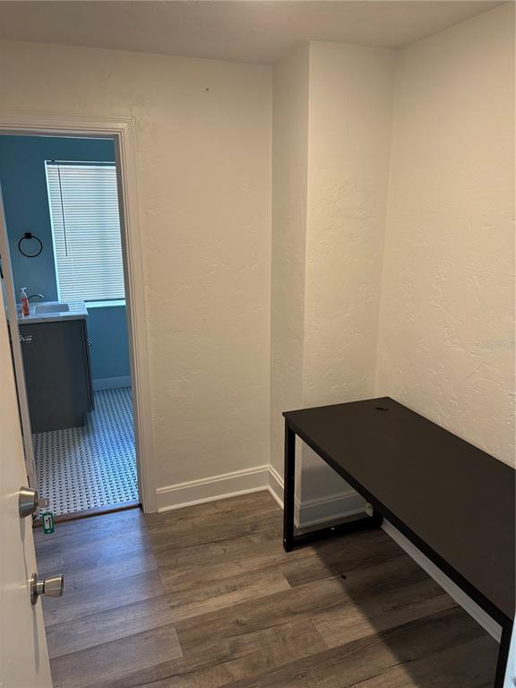 706 Northwest 20th Street Gainesville, FL 32603 - Photo 25 of 46 a view of a room with wooden floor and a sink