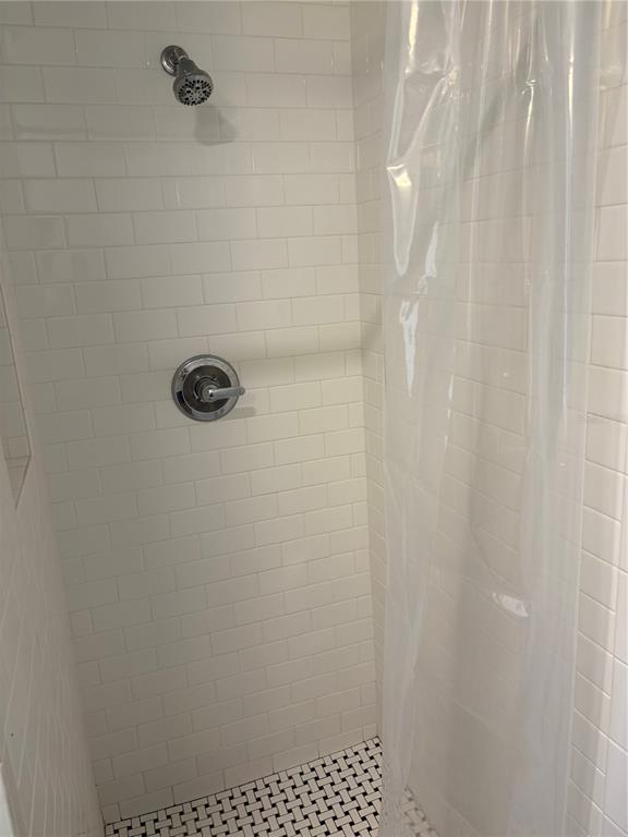 706 Northwest 20th Street Gainesville, FL 32603 - Photo 31 of 46 a bathroom with a shower