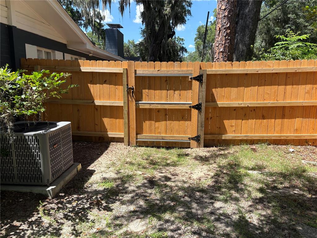 706 Northwest 20th Street Gainesville, FL 32603 - Photo 40 of 46 a backyard of a house