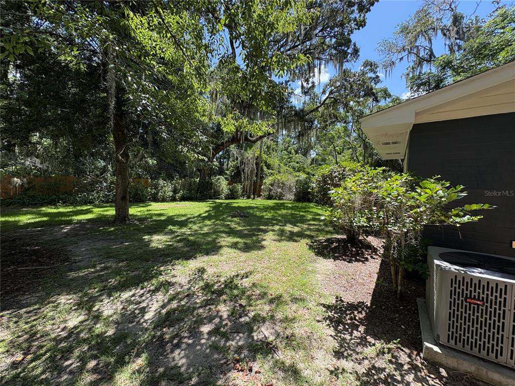 706 Northwest 20th Street Gainesville, FL 32603 - Photo 42 of 46 a view of a garden with plants