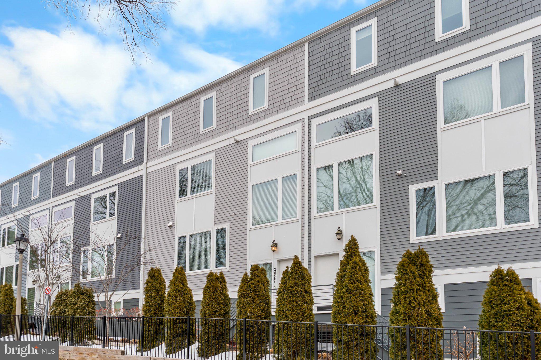 2827 24th Road South Arlington, VA 22206 - Photo 43 of 48 Modern townhomes with lush greenery.