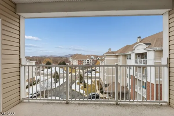 a view of a balcony with city view
