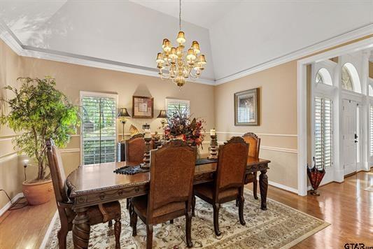 3621 Rock Creek Drive Tyler, TX 75707 - Photo 18 of 29 a view of a dining room with furniture window and wooden floor