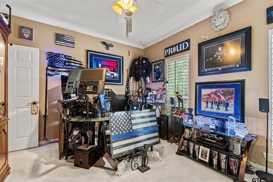 3621 Rock Creek Drive Tyler, TX 75707 - Photo 26 of 29 a living room with furniture and a flat screen tv